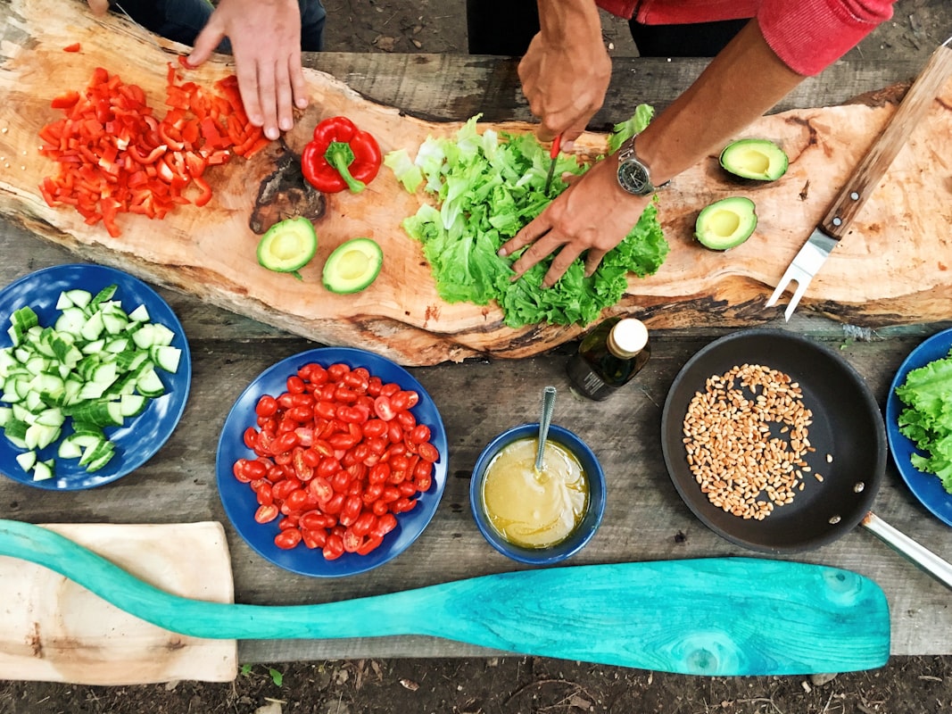 Fresh whole foods including vegetables, grains, and herbs